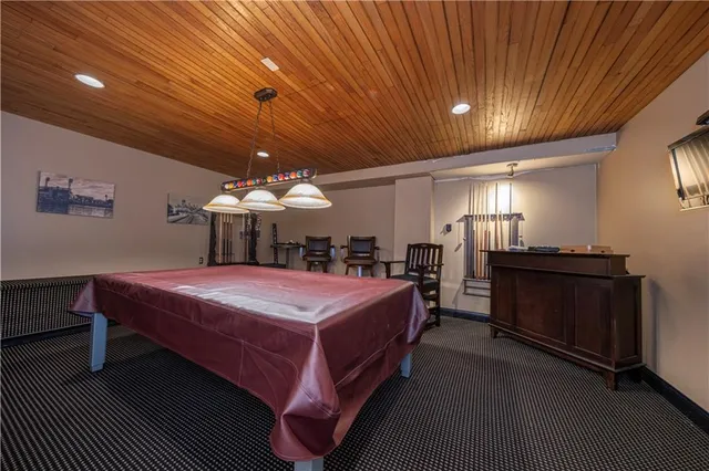 a view of a bike storage and utility room