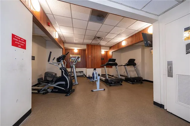 an aerial view of a house with a ocean view