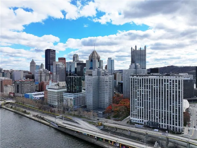 a view of a city with lots of buildings