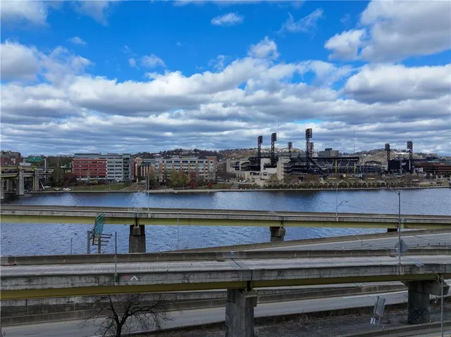 a view of a city street with train