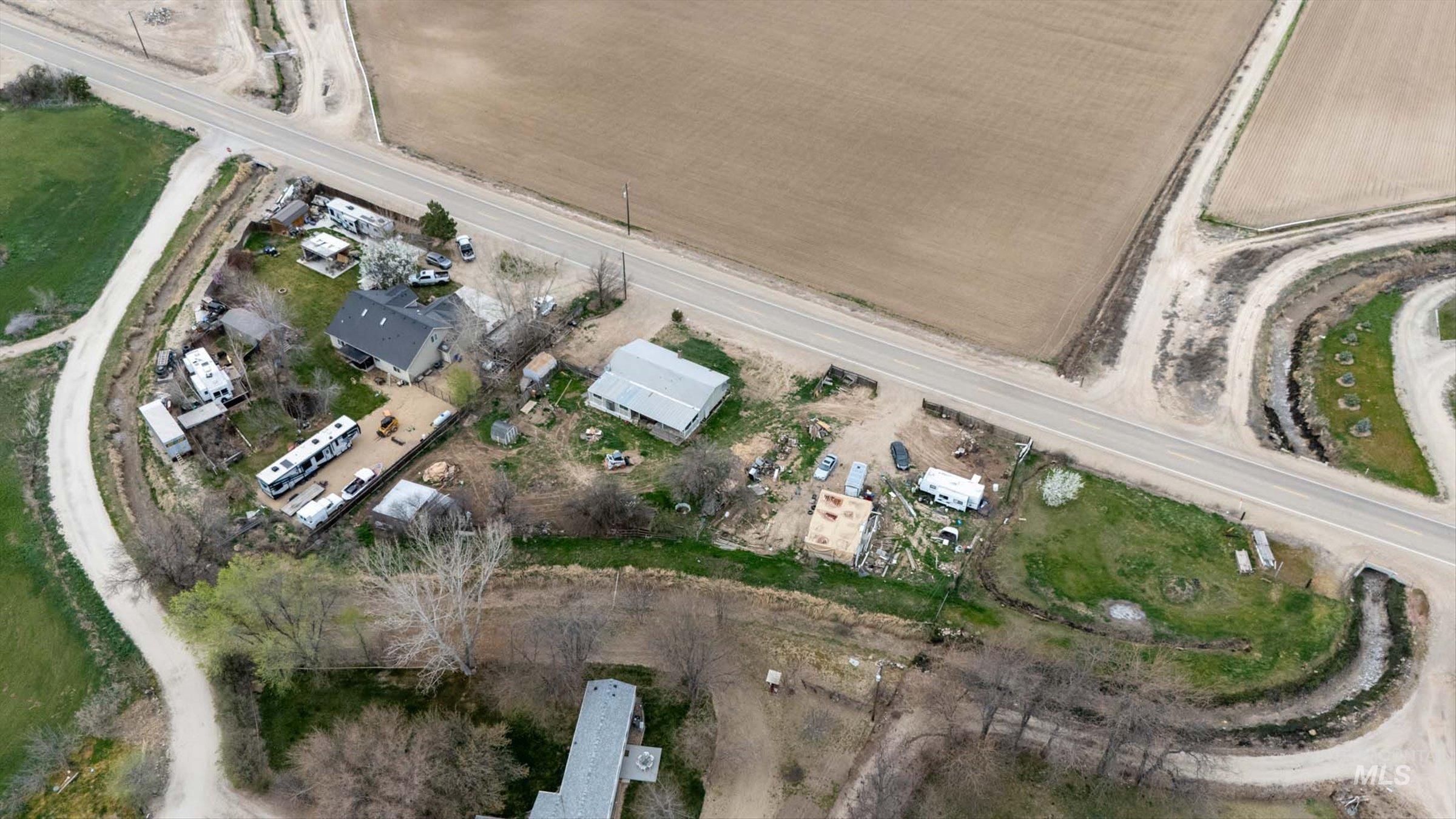 6267 Deer Flat Road Nampa, ID 83686 - Photo 38 of 50 Aerial overview of property's location with rural landscape
