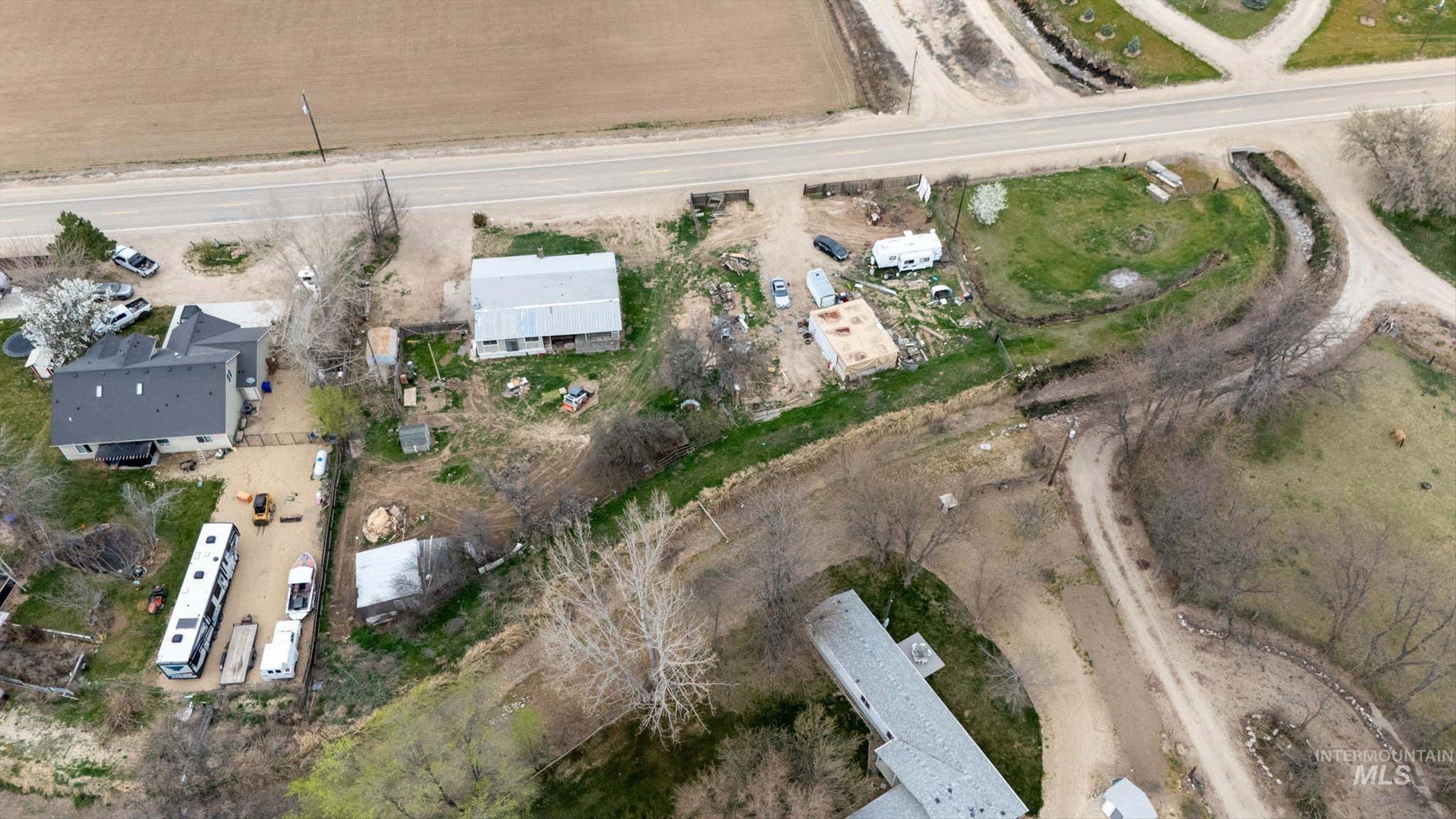 6267 Deer Flat Road Nampa, ID 83686 - Photo 39 of 50 Aerial overview of property's location with rural landscape