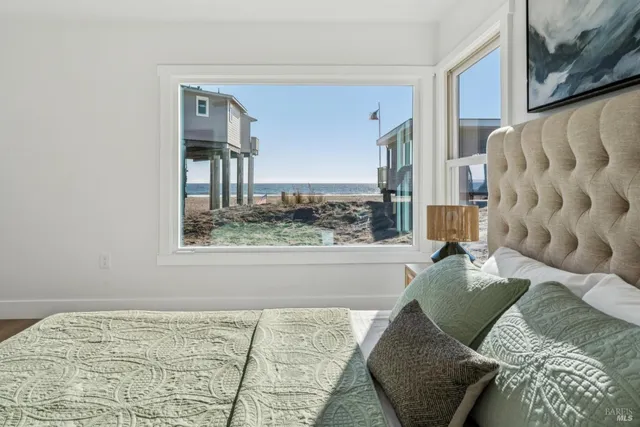 a living room with a couch and a dresser