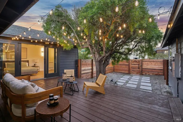 a view of balcony with wooden floor