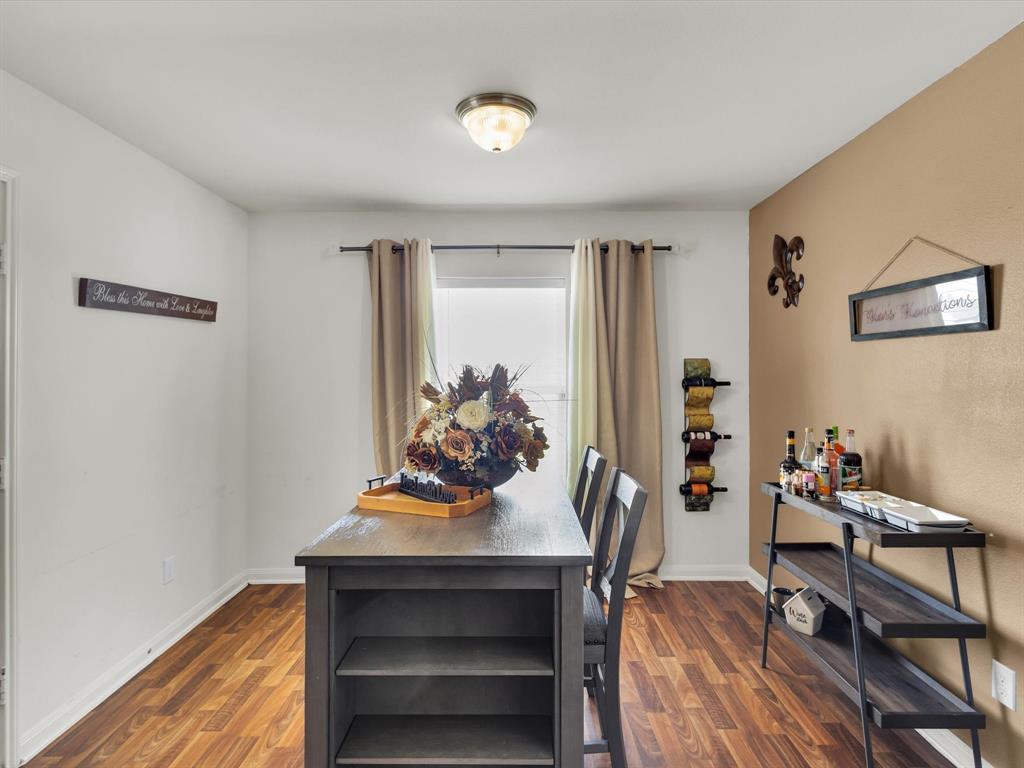 1808 Douglas Street Howe, TX 75459 - Photo 18 of 37 a view of a workspace with furniture and bedroom view