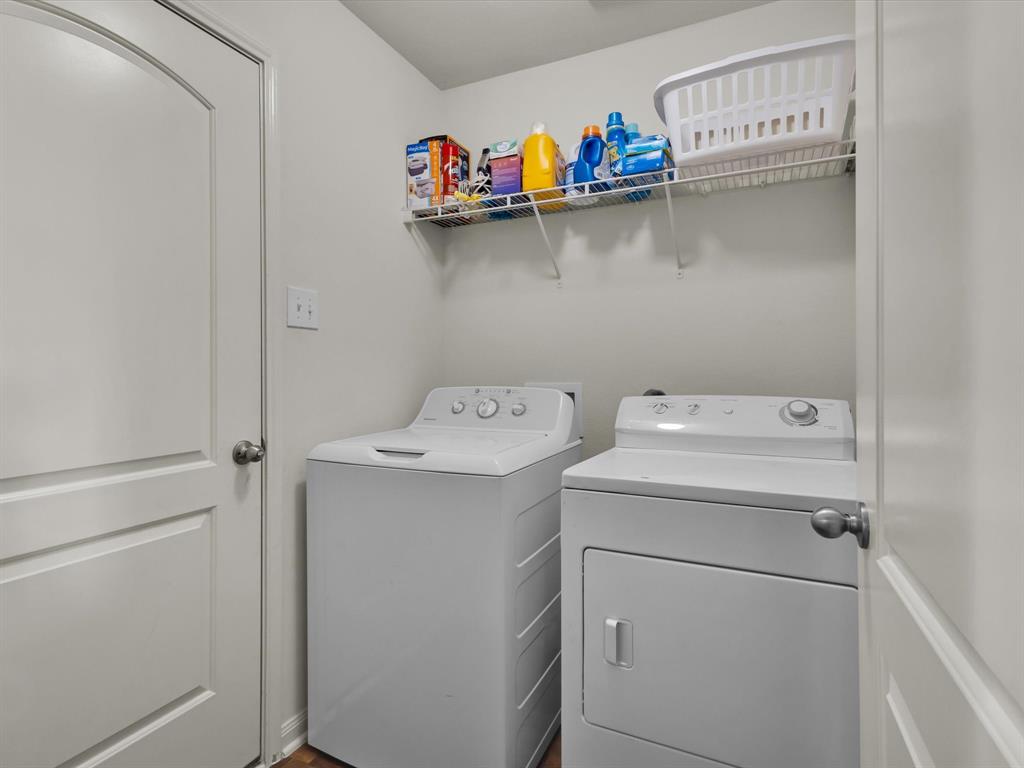 1808 Douglas Street Howe, TX 75459 - Photo 7 of 37 a utility room with dryer and washer