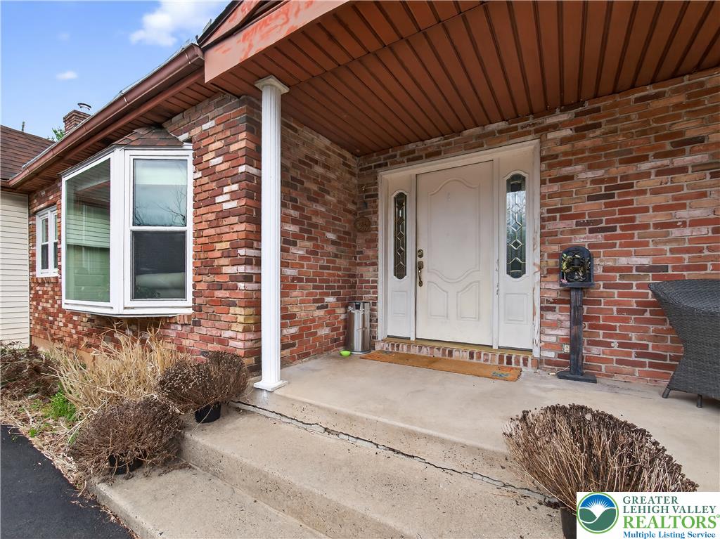 2197 Buck Run Road Quakertown, PA 18951 - Photo 17 of 45 A classic brick exterior welcomes with a charming bay window and a secure entryway.