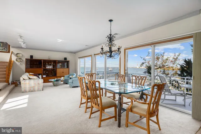 a view of a lake with houses in the back