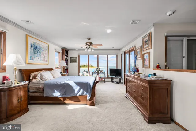 a view of an ocean and city from a balcony