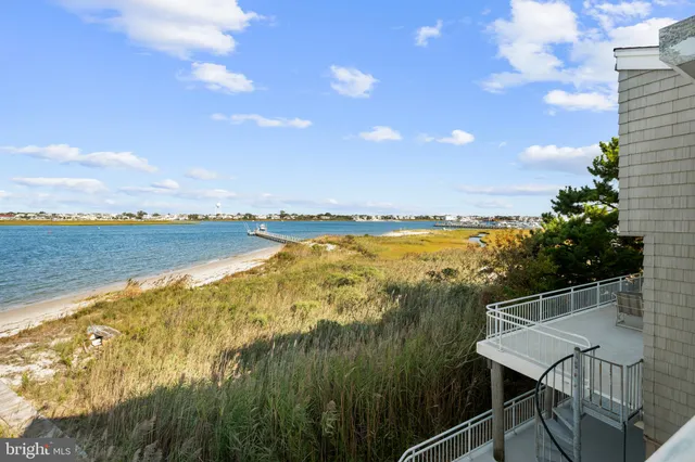 a view of backyard with outdoor seating