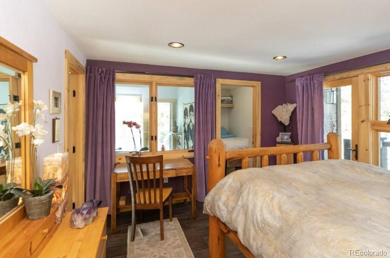 106 Protector Circle Breckenridge, CO 80424 - Photo 17 of 40 a bedroom with a bed and a large window