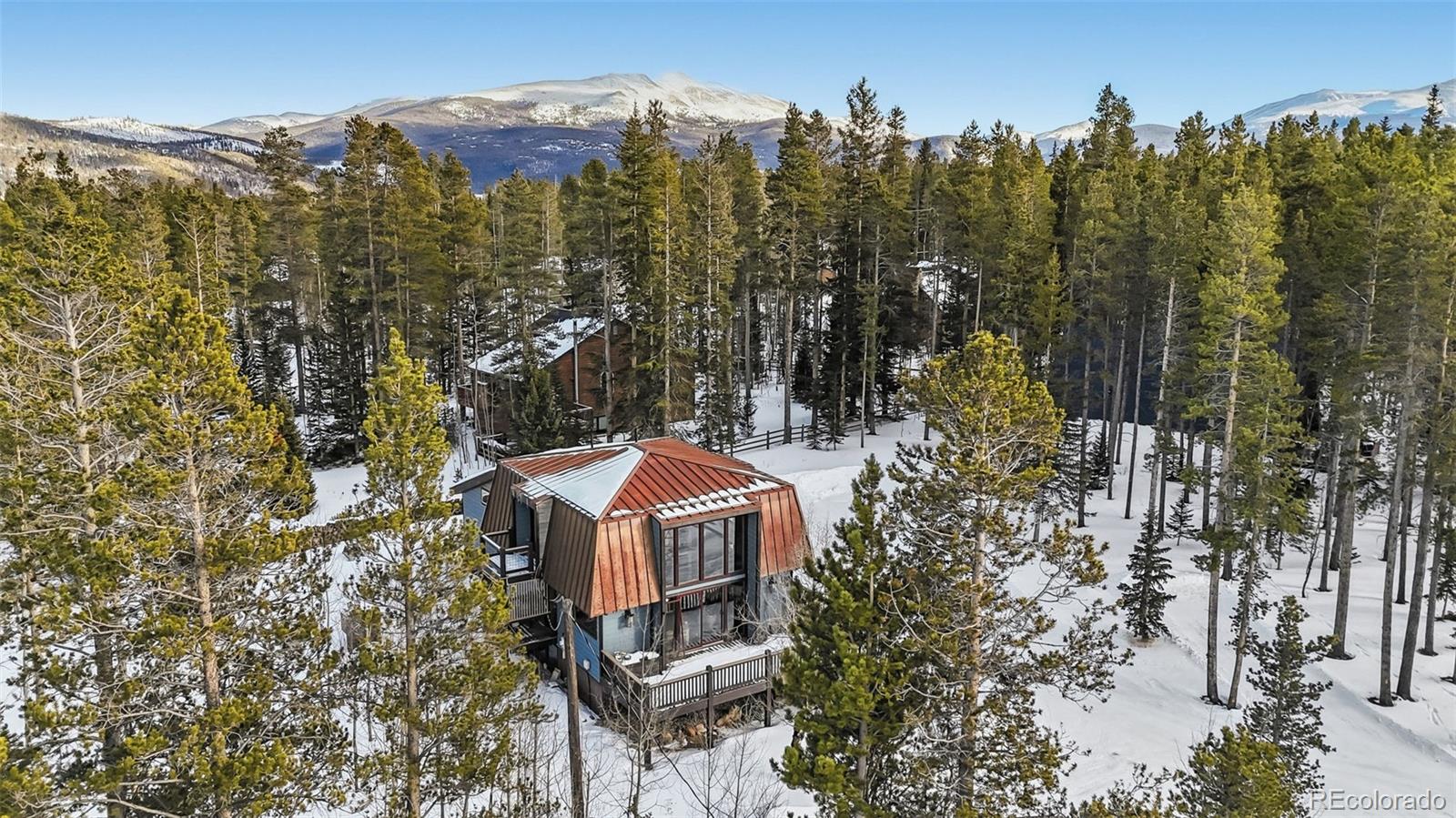 106 Protector Circle Breckenridge, CO 80424 - Photo 33 of 40 a view of a house with a yard and sitting area