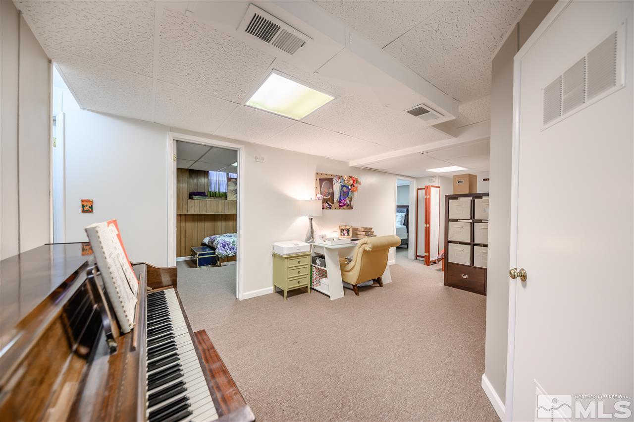 10300 Silva Ranch Road Reno, NV 89523 - Photo 17 of 25 a living room with furniture and a couch