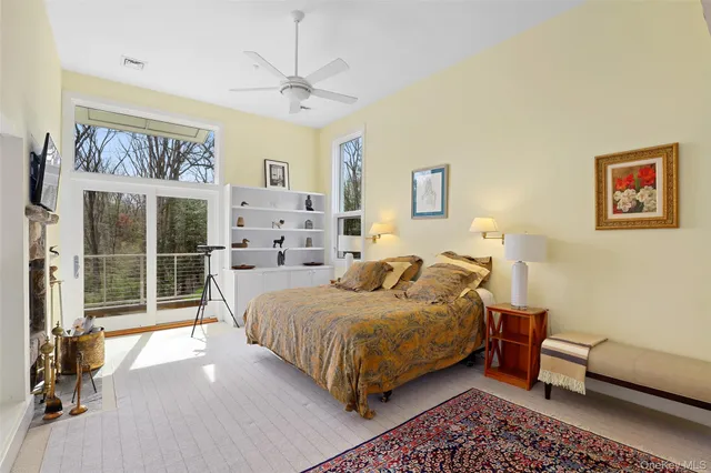 a bedroom with a bed and a couch