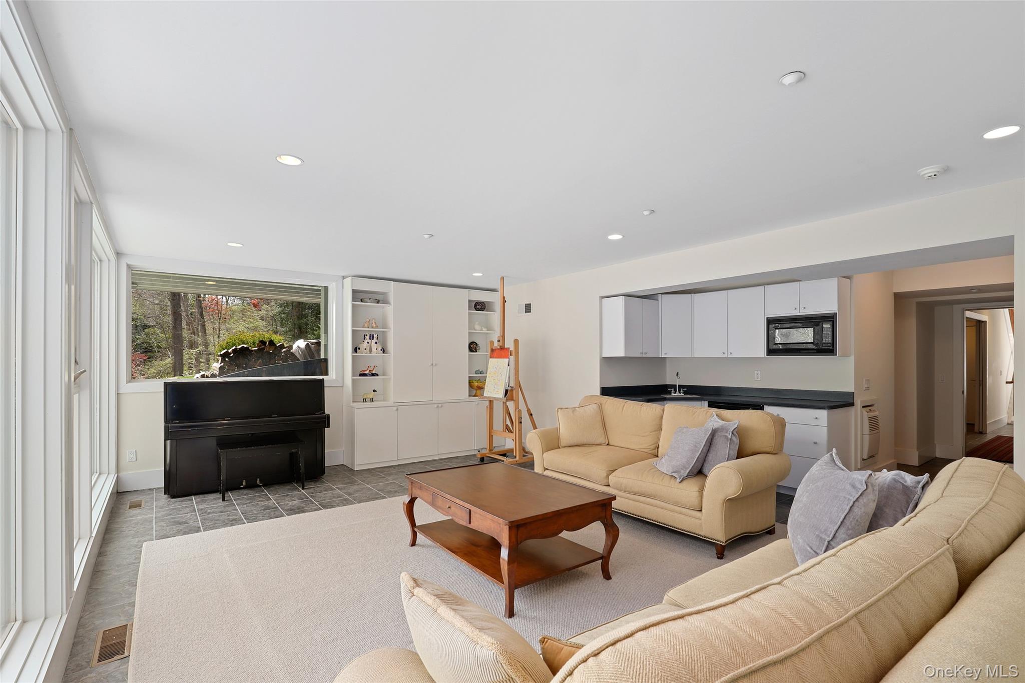 17 Fox Run Road Pound Ridge, NY 10576 - Photo 28 of 30 a living room with furniture and a couch