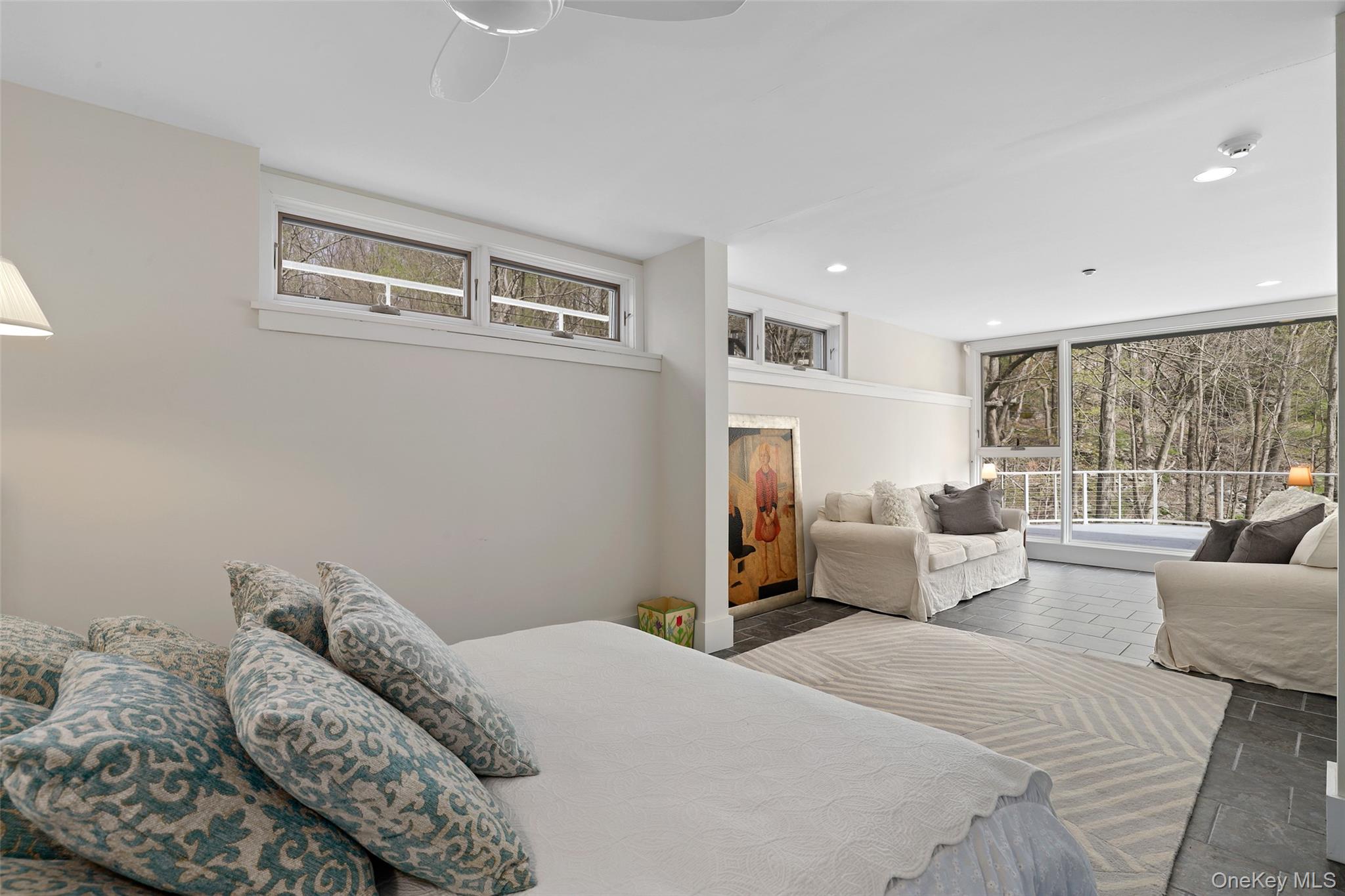 17 Fox Run Road Pound Ridge, NY 10576 - Photo 29 of 30 a bedroom with furniture and a large window