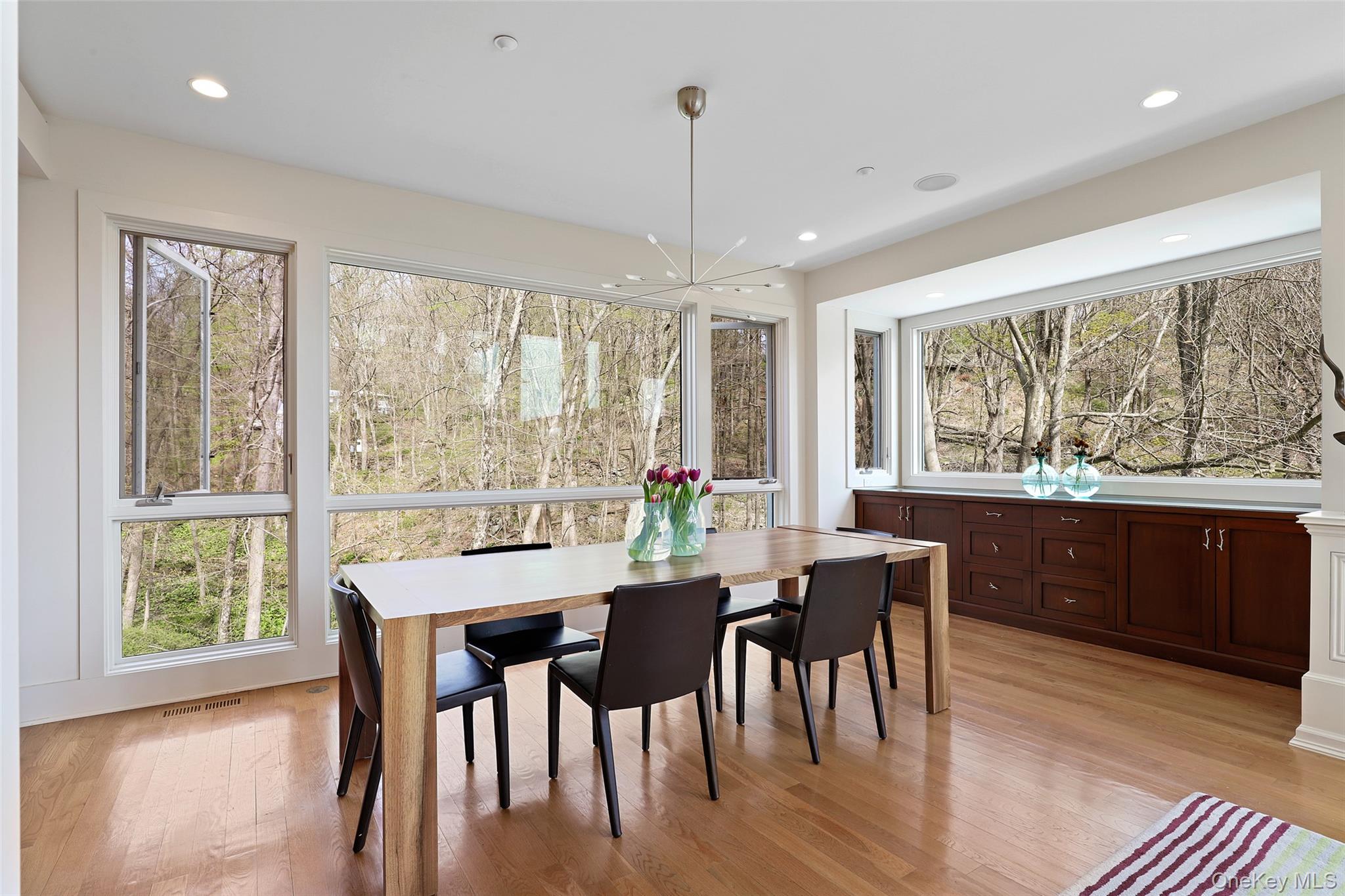 17 Fox Run Road Pound Ridge, NY 10576 - Photo 8 of 30 a view of a dining room with furniture window and wooden floor