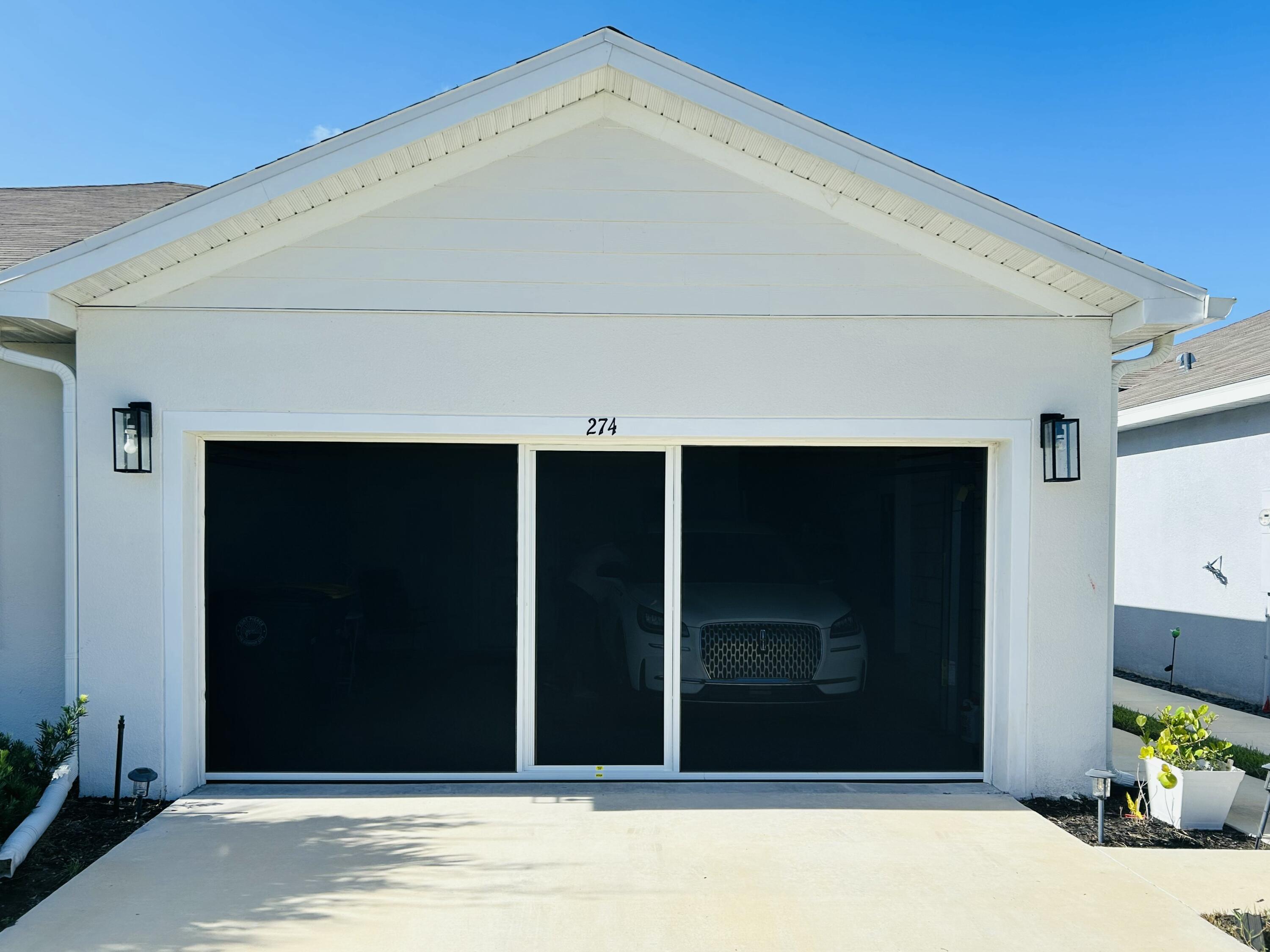 274 Raspberry Road Fort Pierce, FL 34981 - Photo 26 of 33 Garage Screen Enclosure