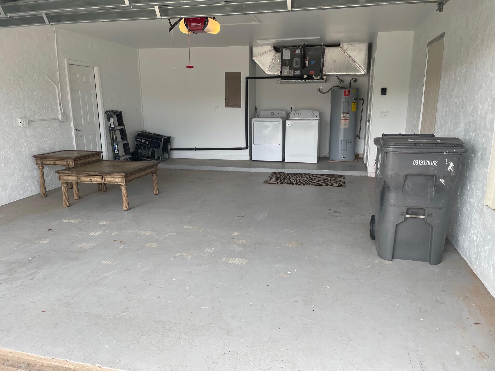 2601 West Carandis Road West Palm Beach, FL 33406 - Photo 13 of 13 a room with a table and chairs