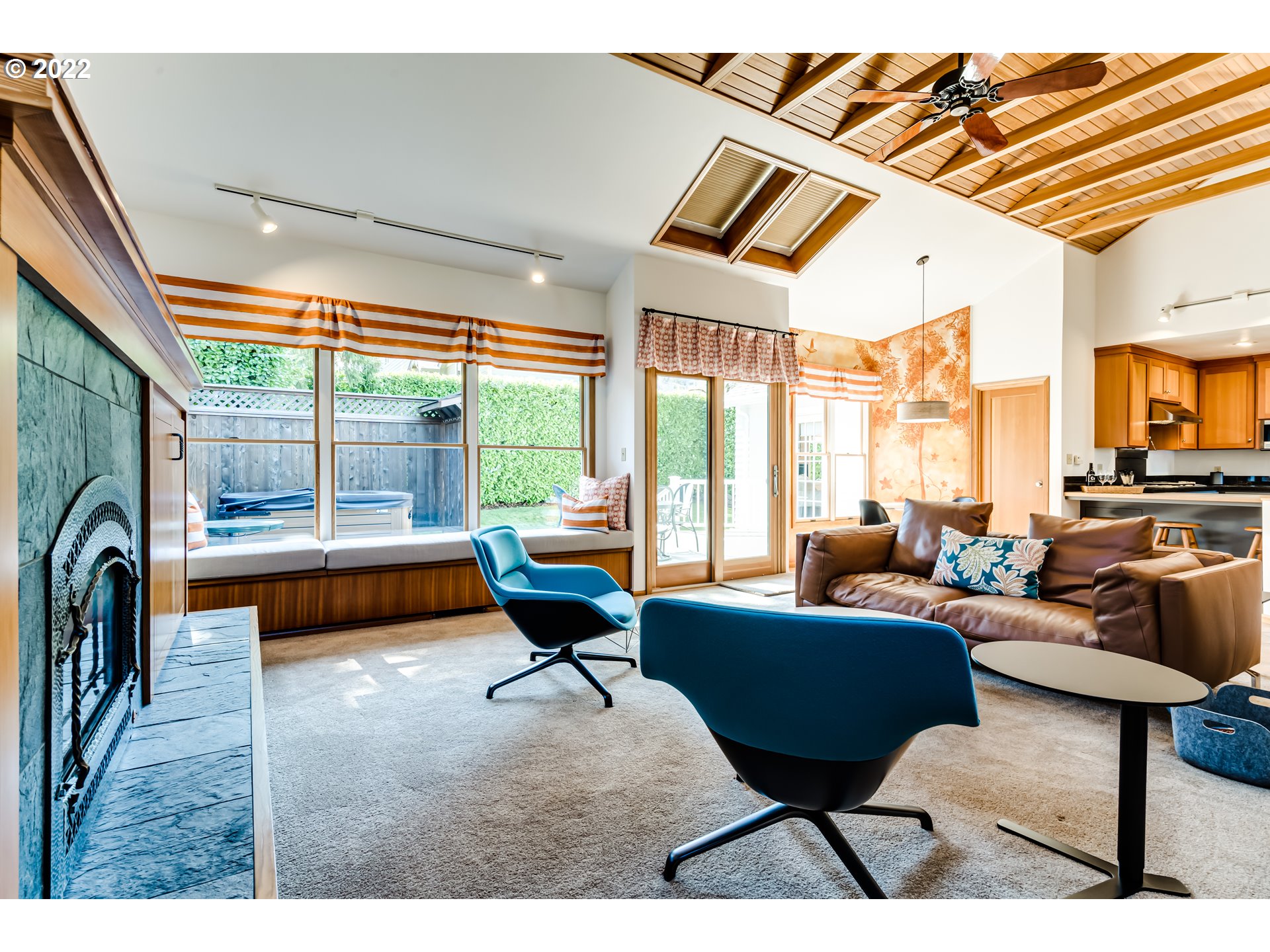 2059 Orchard Street Eugene, OR 97403 - Photo 14 of 32 a living room with furniture a rug and a floor to ceiling window