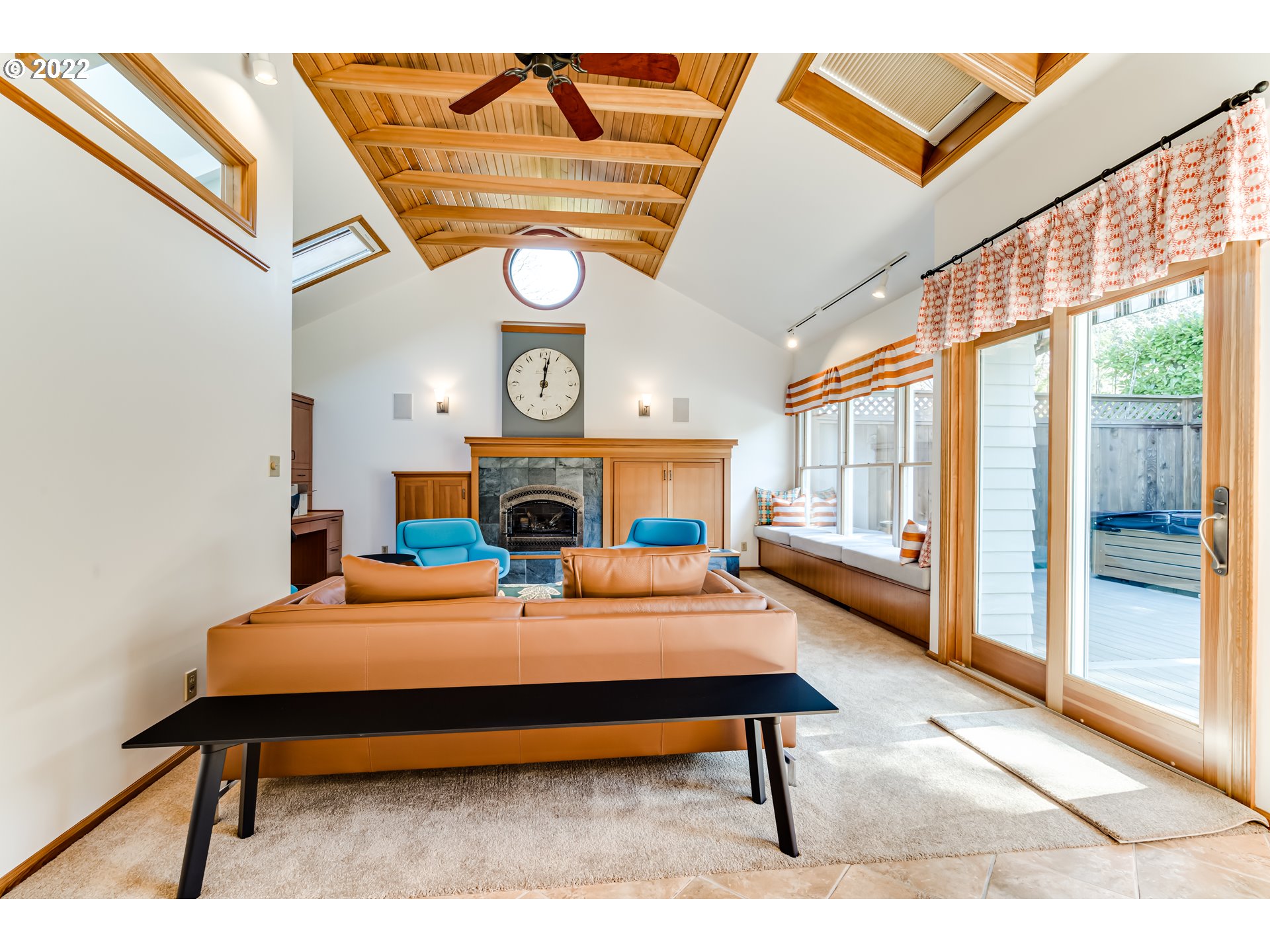 2059 Orchard Street Eugene, OR 97403 - Photo 18 of 32 a living room with a table a rug and a wall painting