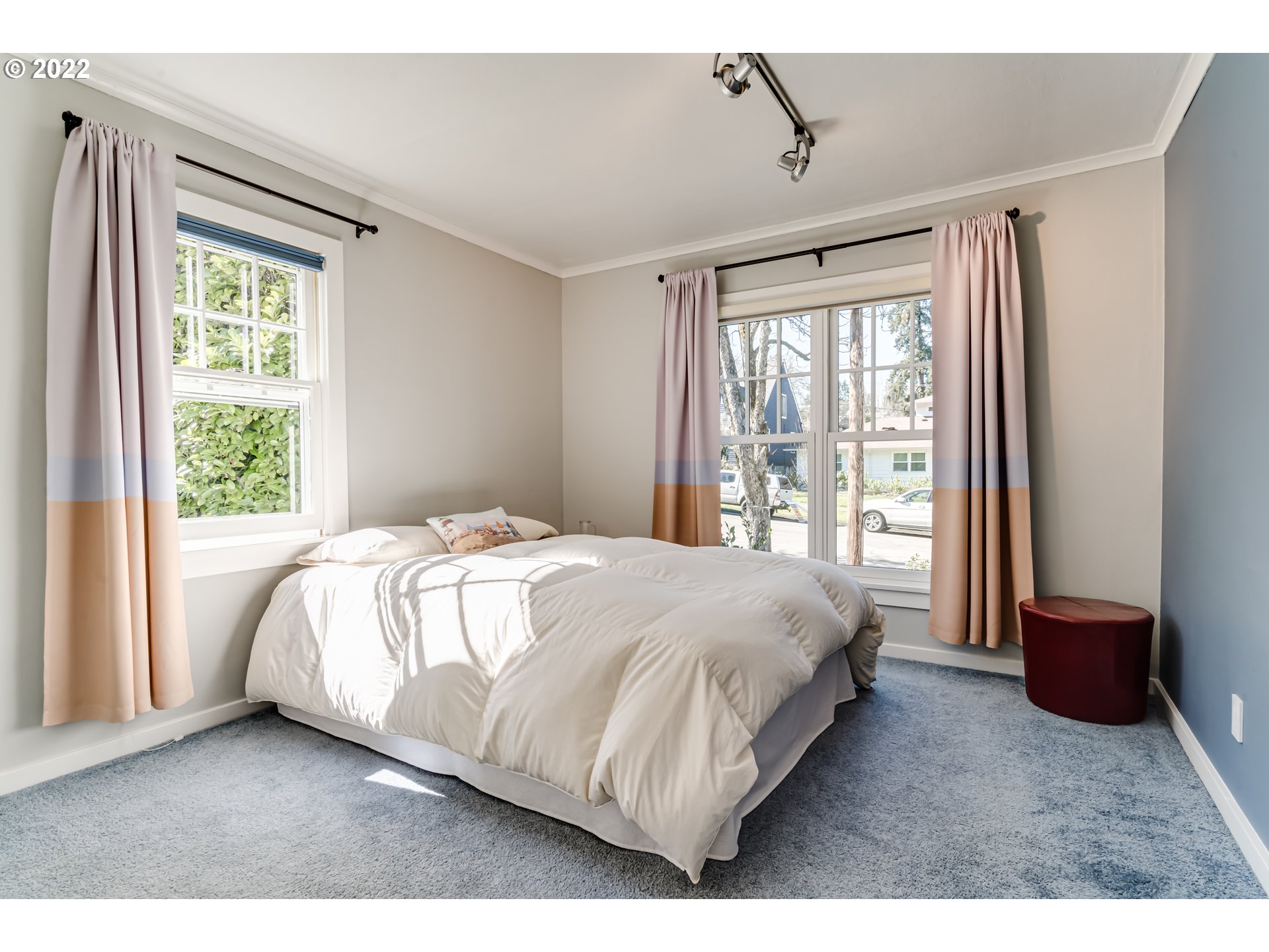 2059 Orchard Street Eugene, OR 97403 - Photo 19 of 32 a bedroom with a bed and a large window