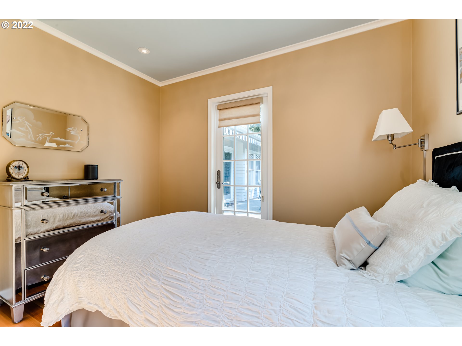 2059 Orchard Street Eugene, OR 97403 - Photo 20 of 32 a bedroom with a bed and a lamp