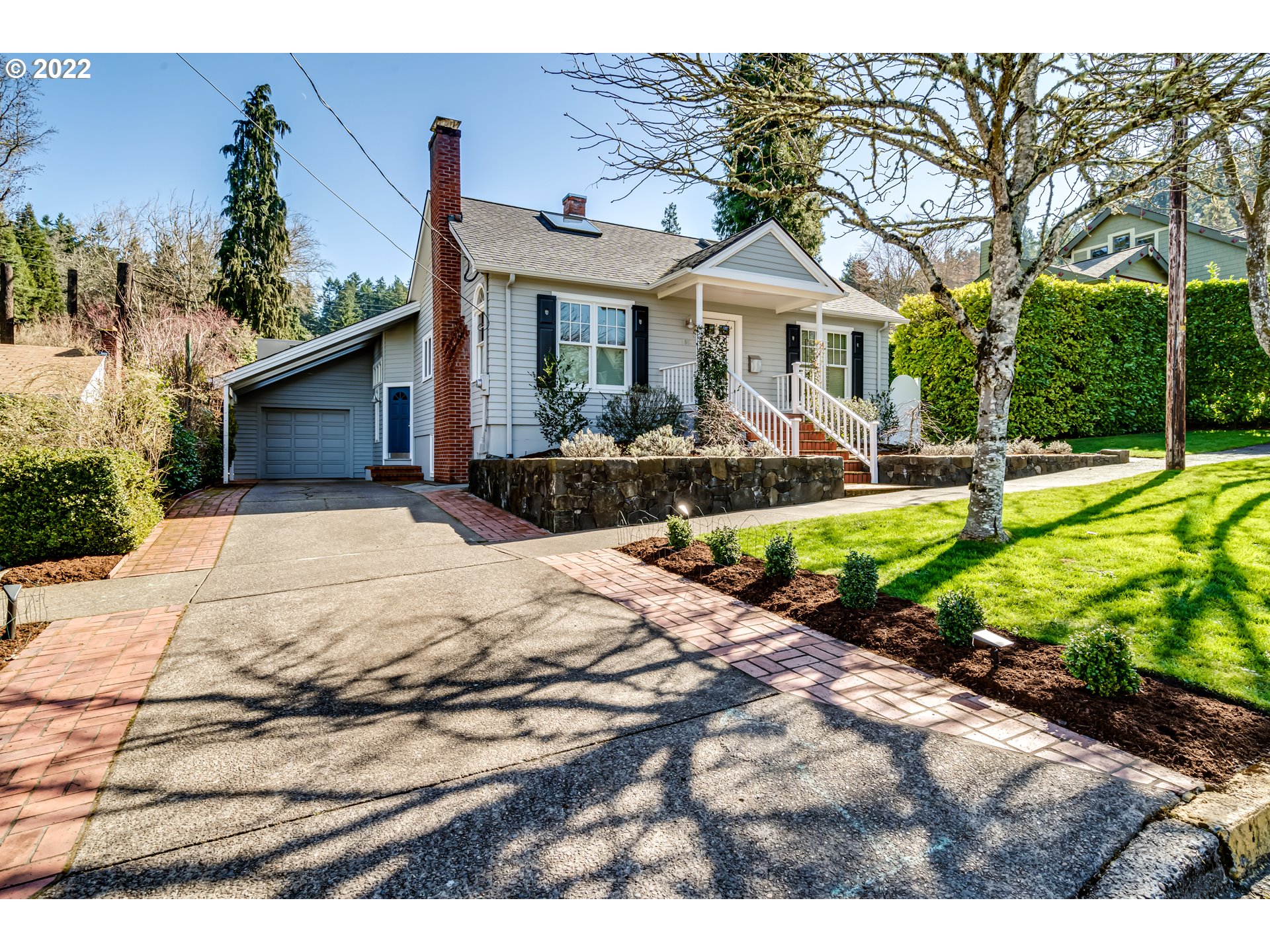 2059 Orchard Street Eugene, OR 97403 - Photo 2 of 32 a front view of a house with garden and porch