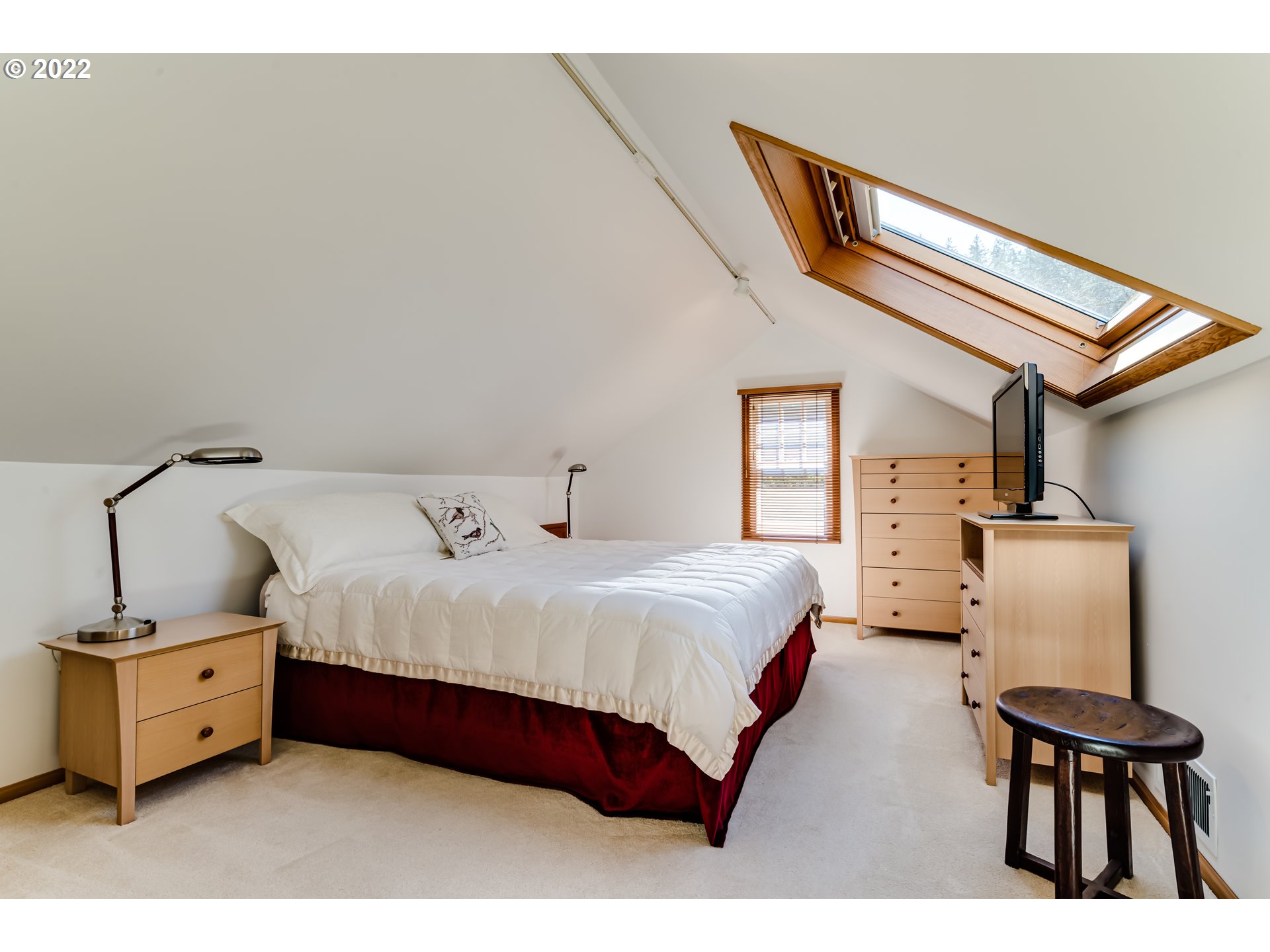 2059 Orchard Street Eugene, OR 97403 - Photo 23 of 32 a bedroom with a bed and a dresser