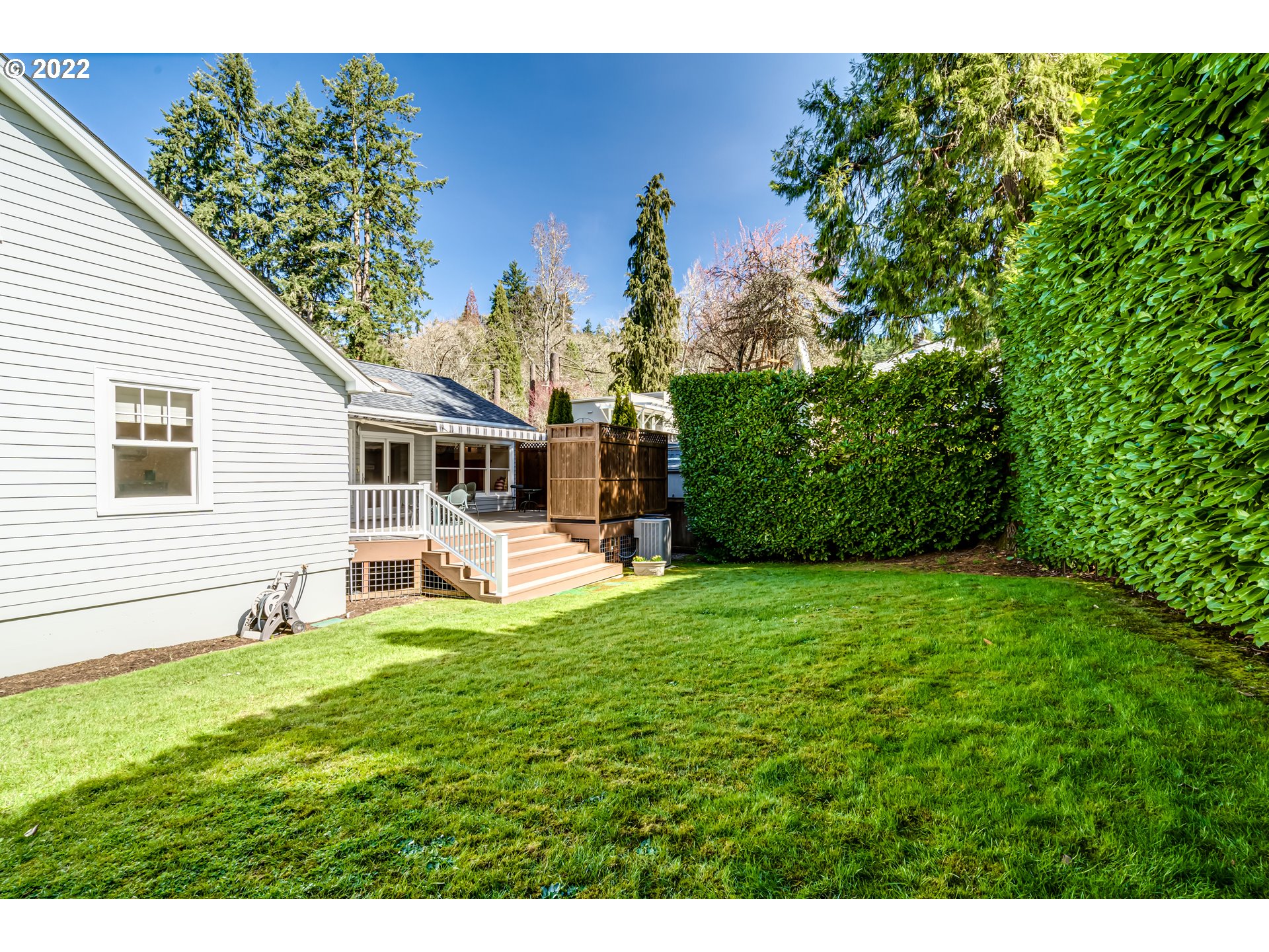 2059 Orchard Street Eugene, OR 97403 - Photo 32 of 32 a backyard of a house with table and chairs