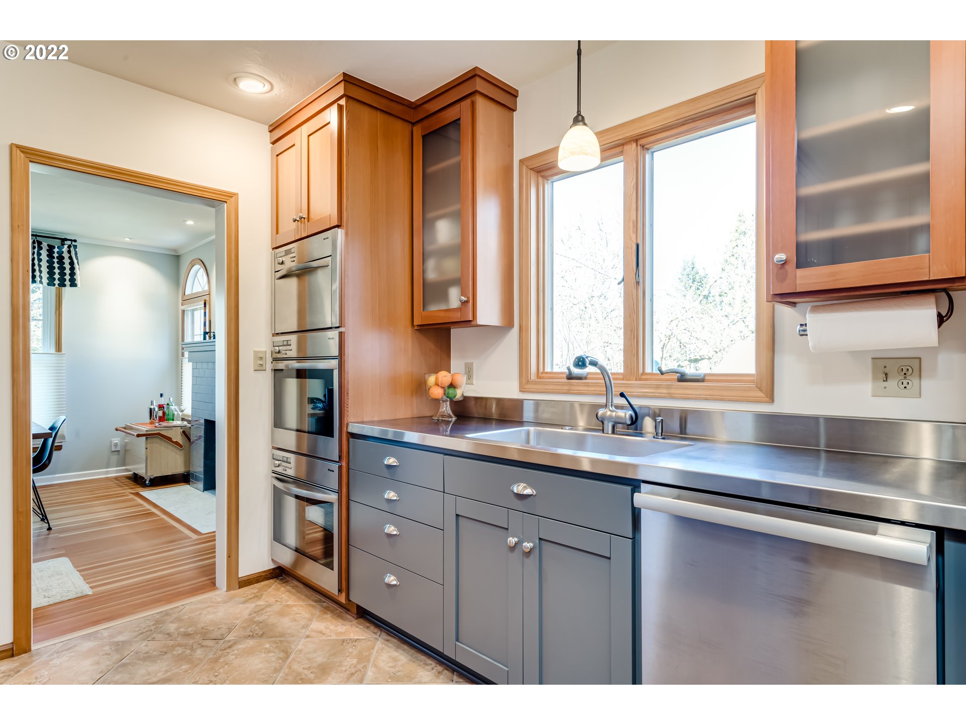 2059 Orchard Street Eugene, OR 97403 - Photo 8 of 32 a kitchen with a sink cabinets and window