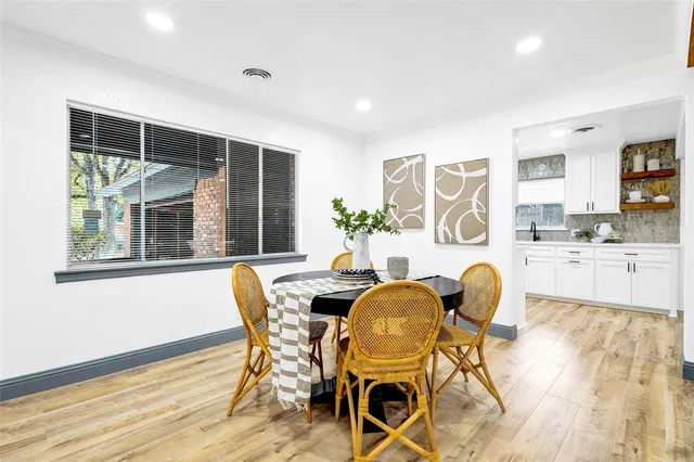 an empty room with closet and a ceiling fan