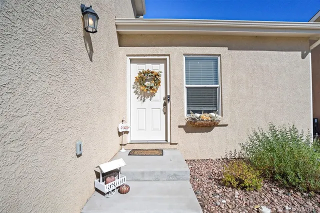 an aerial view of a house with a ocean view