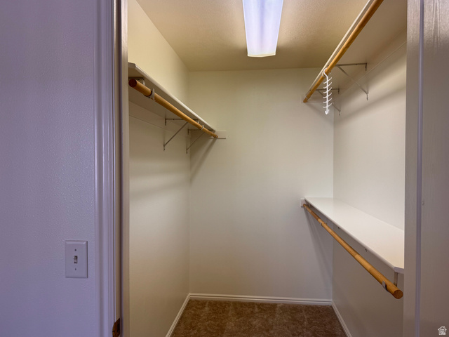 461 Topaz Boulevard, Unit 6 Delta, UT 84624 - Photo 18 of 45 Walk in closet in primary bedroom