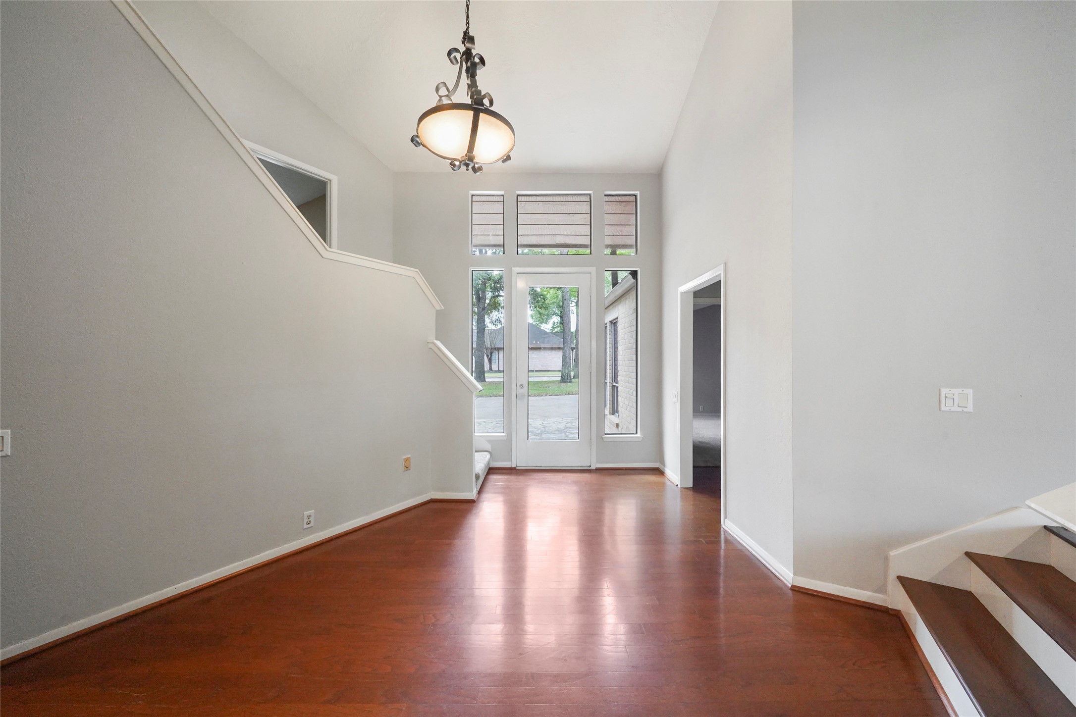 84 April Wind Drive South Conroe, TX 77356 - Photo 12 of 36 a view of empty room with wooden floor and fan