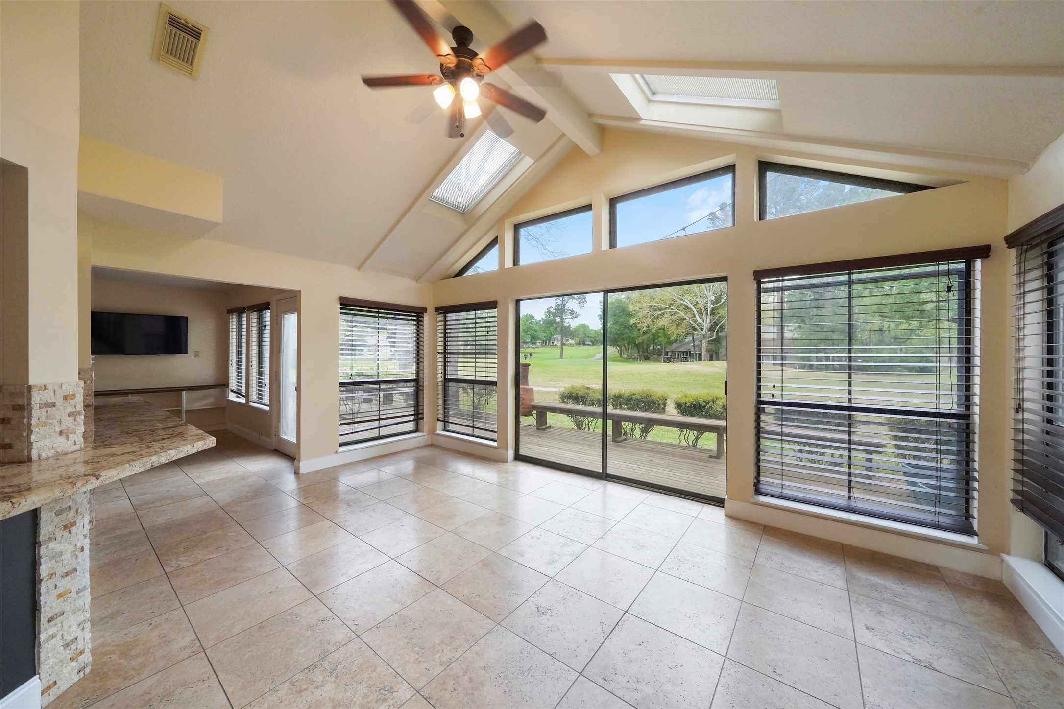84 April Wind Drive South Conroe, TX 77356 - Photo 19 of 36 a view of an entryway with a ceiling fan