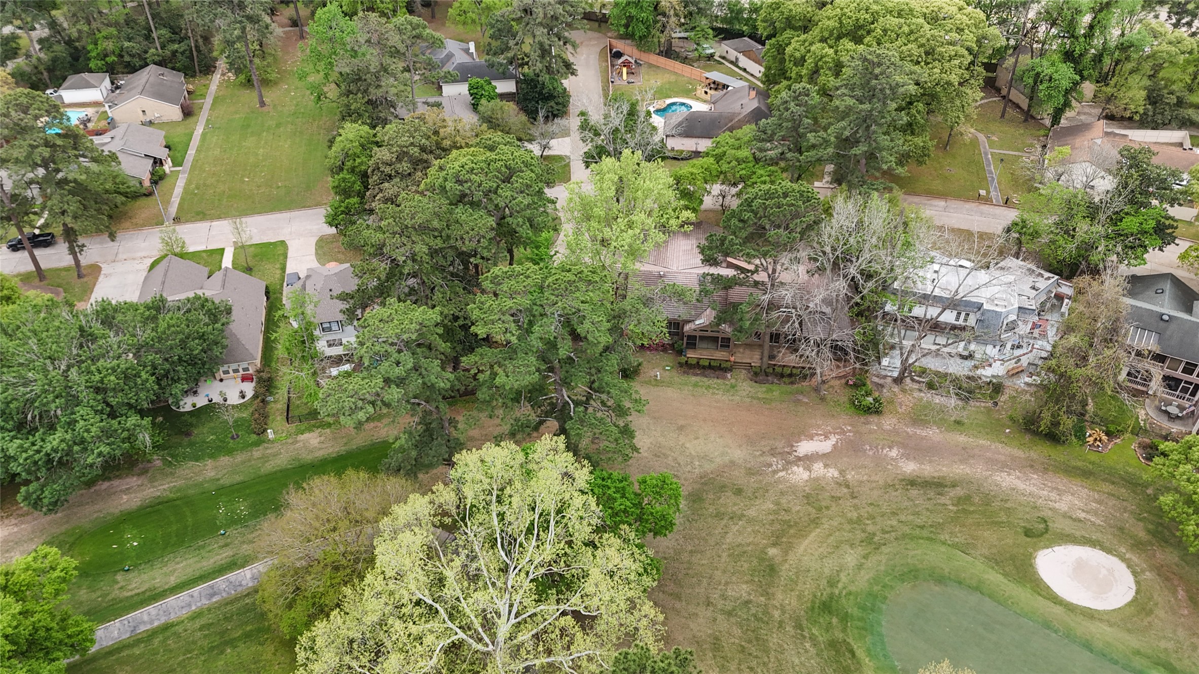 84 April Wind Drive South Conroe, TX 77356 - Photo 36 of 36 an aerial view of residential house with outdoor space and trees all around