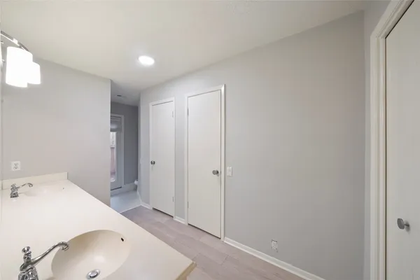 a bathroom with a sink and a tub