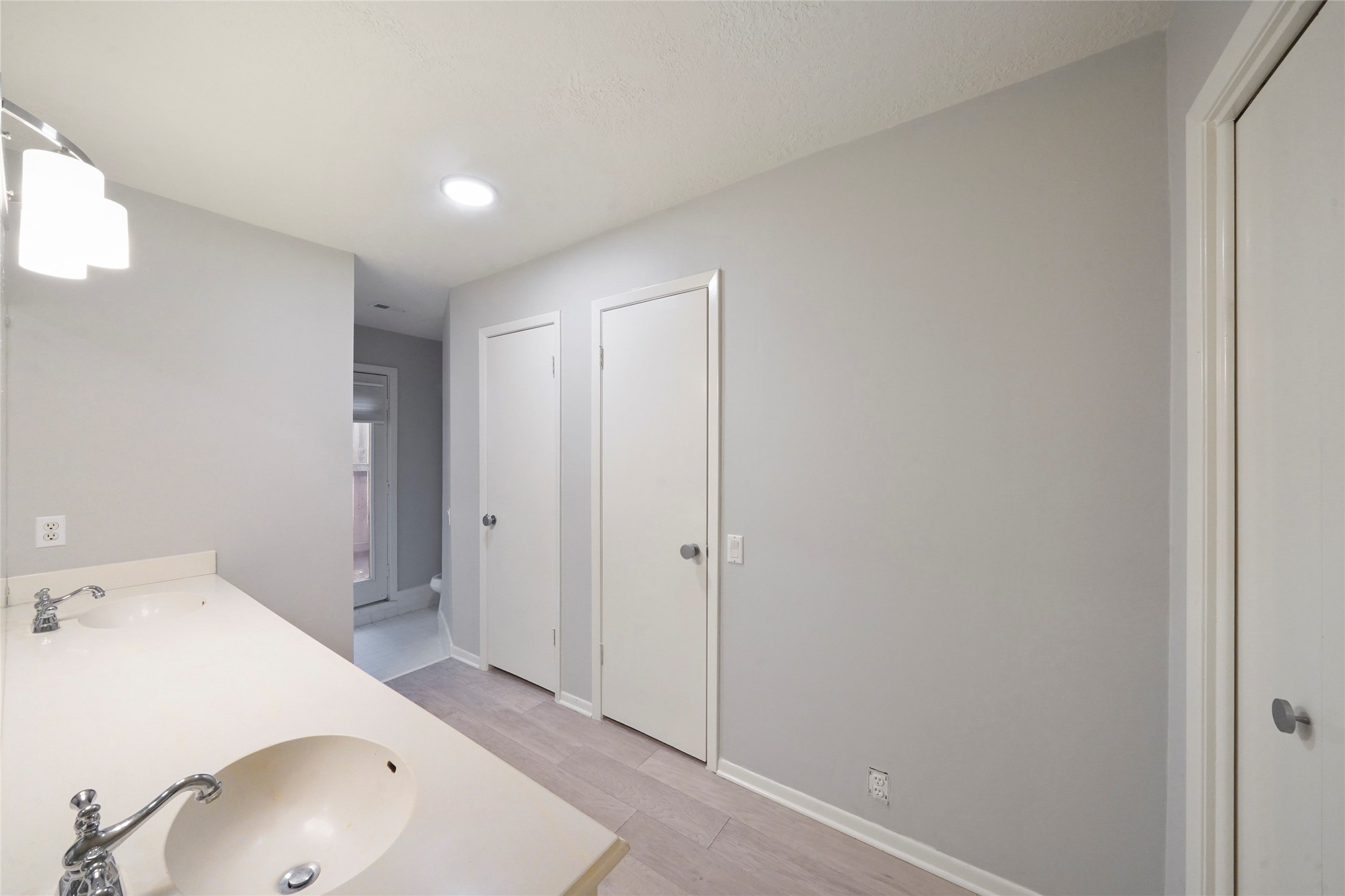 84 April Wind Drive South Conroe, TX 77356 - Photo 5 of 36 a bathroom with a sink and a tub
