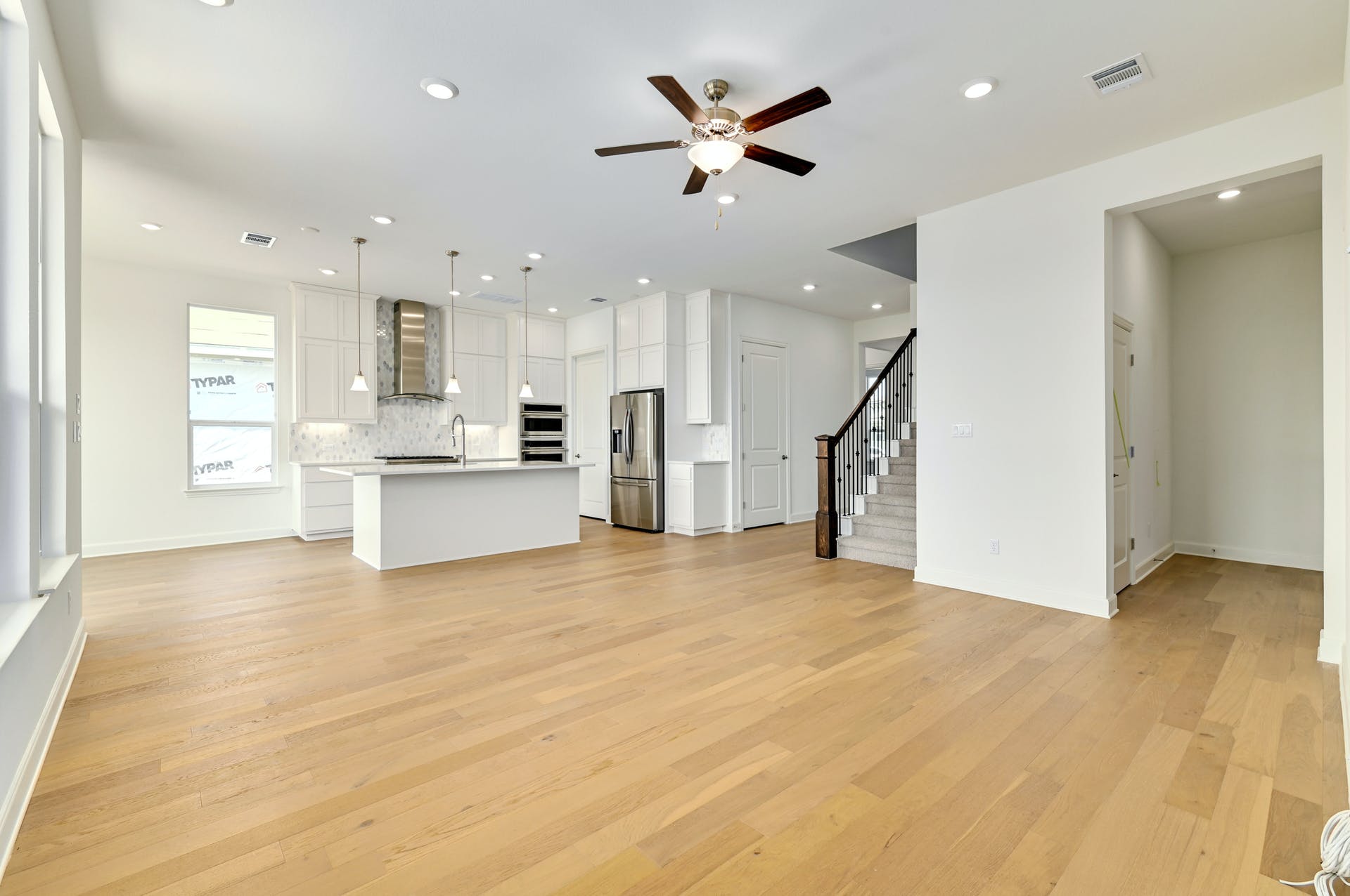 19005 Fernando Trail Austin, TX 78738 - Photo 10 of 35 Spacious living room with light wood finished floors, a ceiling fan, and recessed lighting