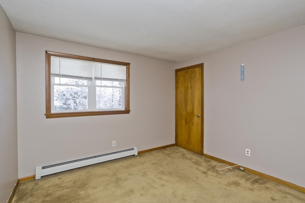 46 Glenn Street Three Rivers, MA 01080 - Photo 11 of 37 an empty room with a window