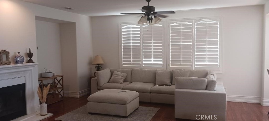 28799 First Star Court Menifee, CA 92584 - Photo 12 of 19 a living room with furniture and a window