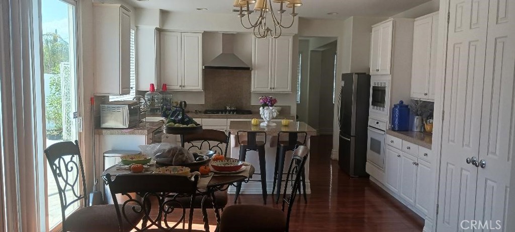28799 First Star Court Menifee, CA 92584 - Photo 14 of 19 a view of a dining room with furniture window and outside view