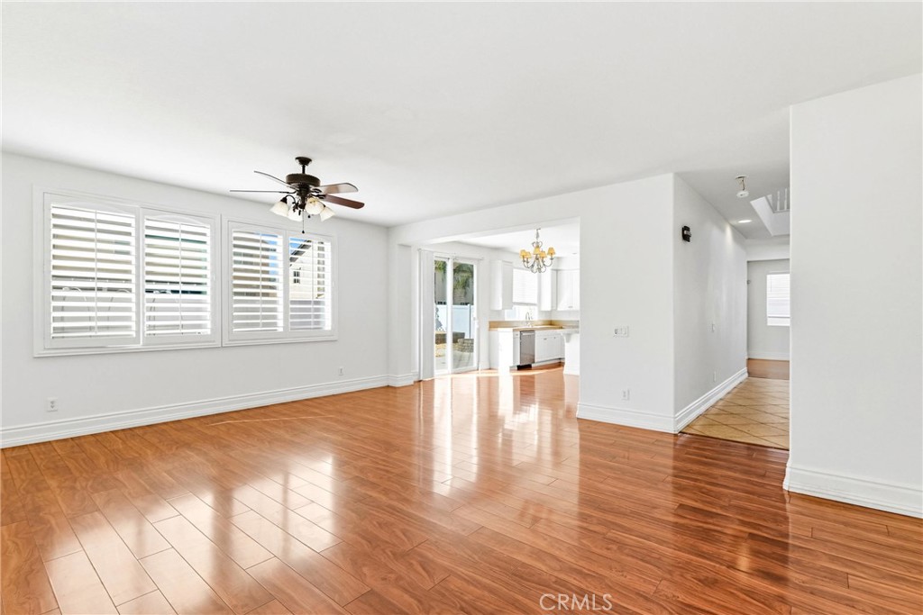 28799 First Star Court Menifee, CA 92584 - Photo 26 of 70 a view of an empty room with wooden floor and a window