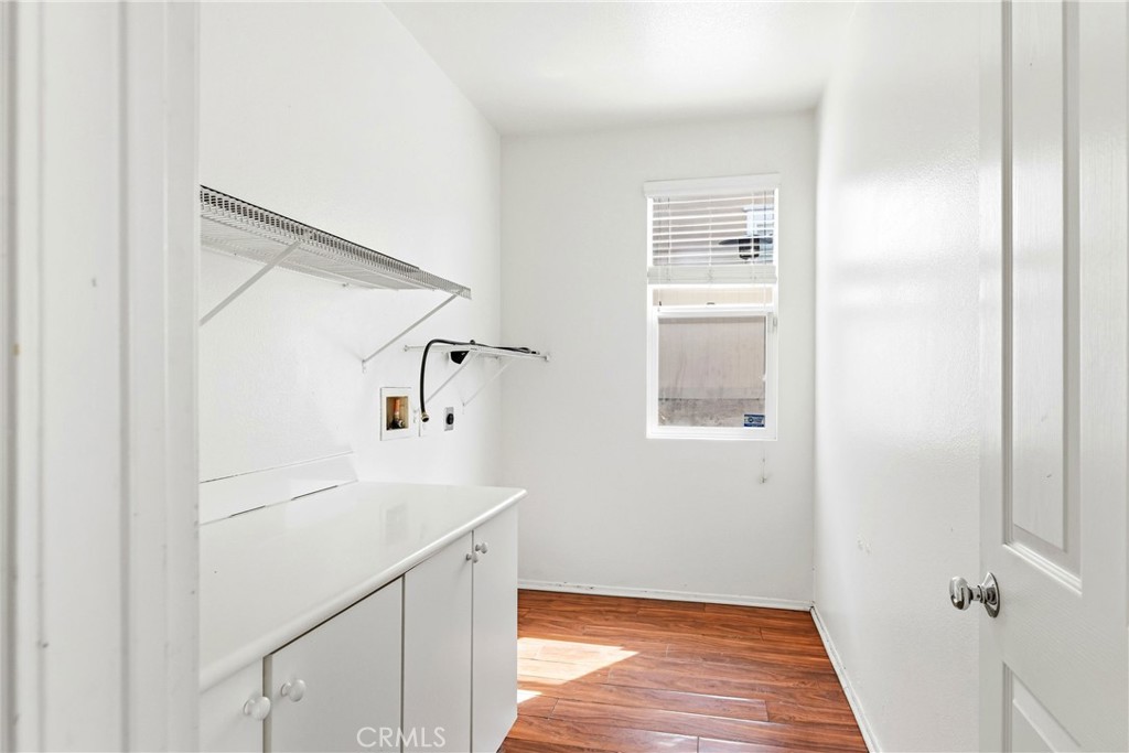 28799 First Star Court Menifee, CA 92584 - Photo 28 of 70 a bathroom with a sink a toilet and shower