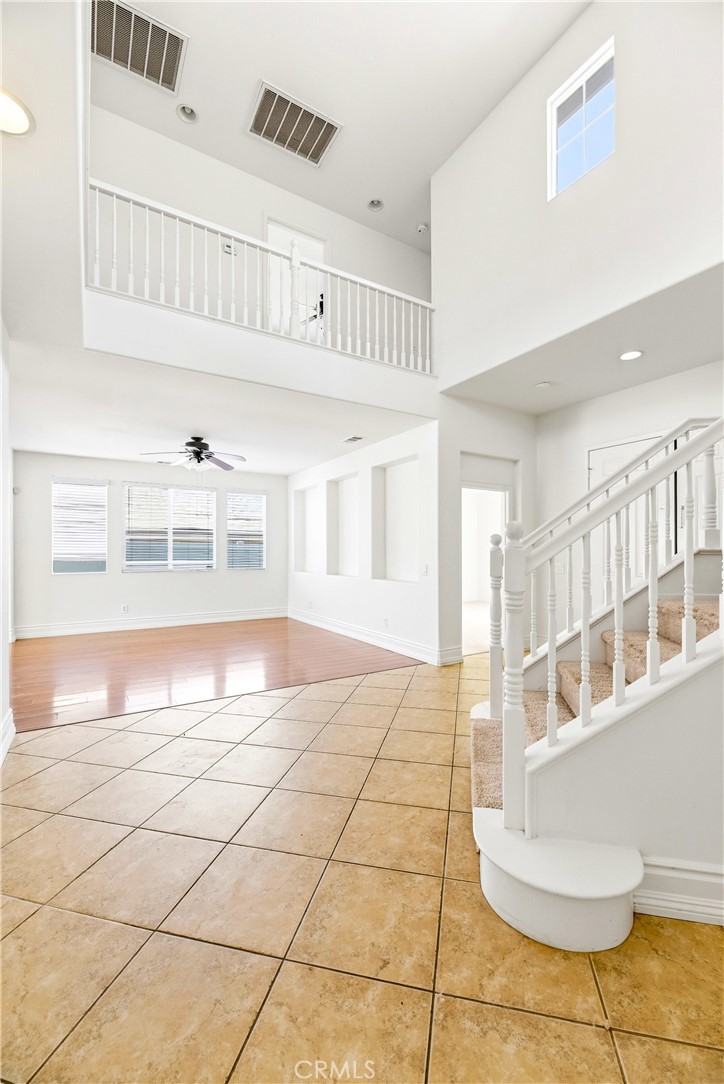 28799 First Star Court Menifee, CA 92584 - Photo 31 of 70 a view of an entryway with wooden floor