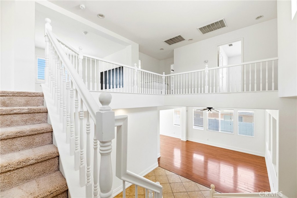 28799 First Star Court Menifee, CA 92584 - Photo 32 of 70 a view of an entryway with staircase