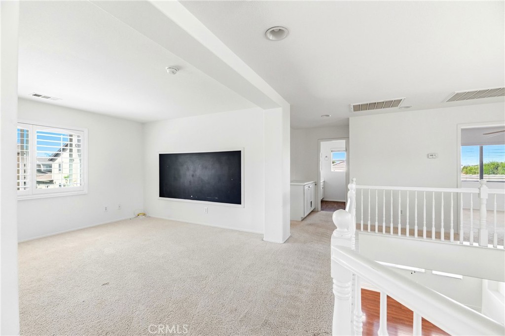 28799 First Star Court Menifee, CA 92584 - Photo 33 of 70 a view of a livingroom with furniture and windows