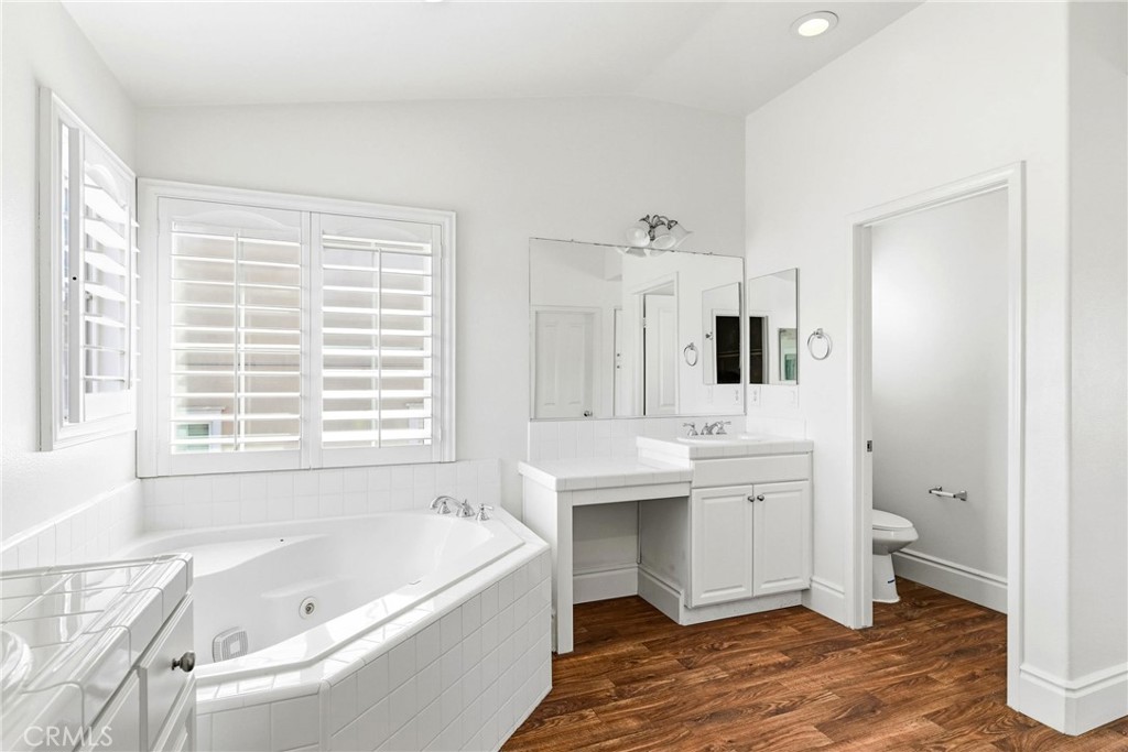 28799 First Star Court Menifee, CA 92584 - Photo 38 of 70 a bathroom with a bathtub sink and toilet
