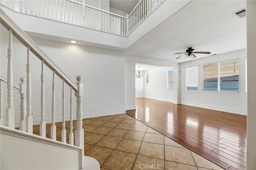 28799 First Star Court Menifee, CA 92584 - Photo 4 of 70 a view of an entryway with wooden floor